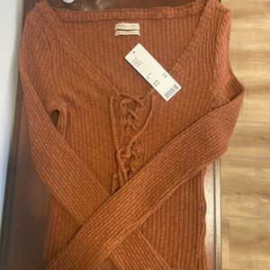 UO dark brown lace up top